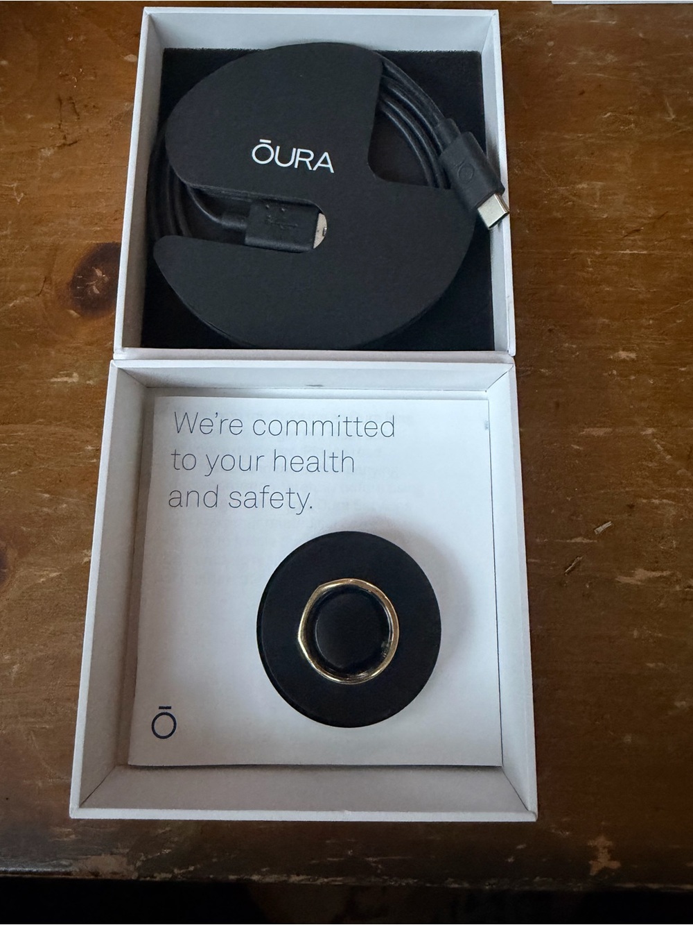 Oura Ring Magnetic Charger in Black with Gold Accent